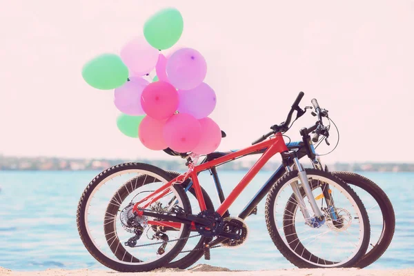 Colorful balloons and bicycles