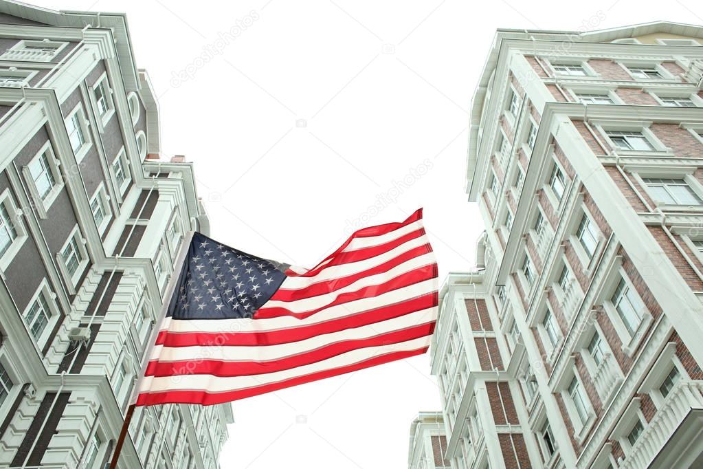 American flag and  buildings 