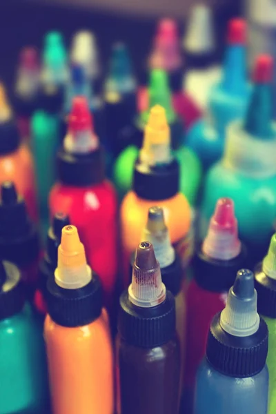 Bottles with colorful inks — Stock Photo, Image