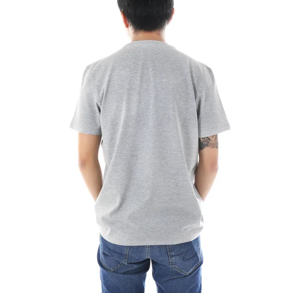 Jonge man in lege t-shirt — Stockfoto