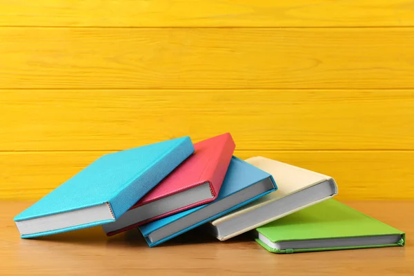 Colorful stacked notebooks — Stock Photo, Image