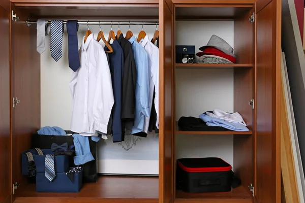Man's clothes in wardrobe — Stock Photo, Image