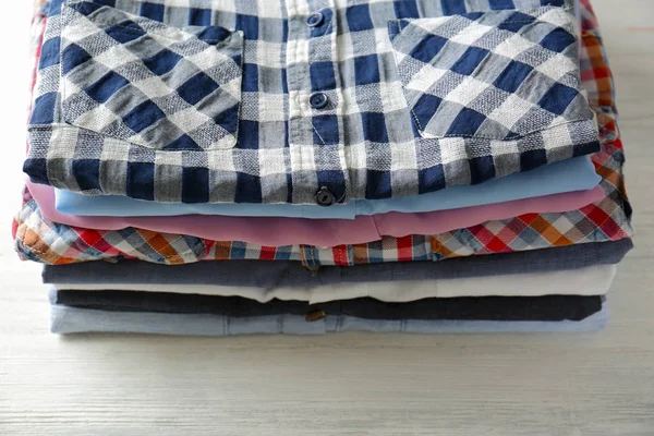 Stack of colorful shirts — Stock Photo, Image