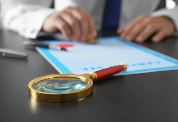 Magnifier on notary public table — Stock Photo, Image