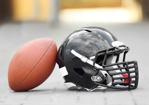 Rugby helmet with ball — Stock Photo, Image