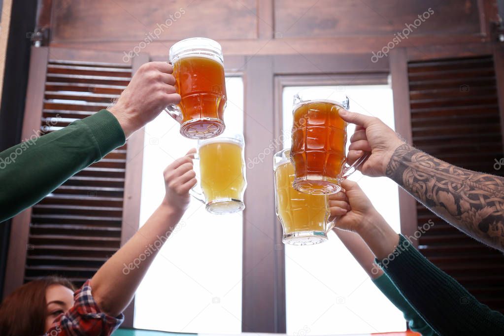people with beer celebrating