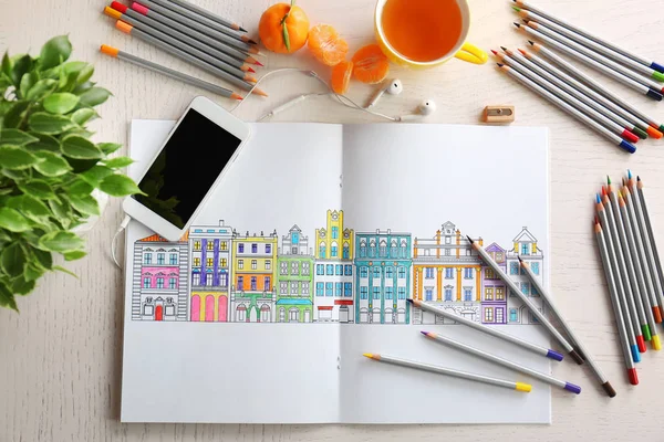 Colouring book and pencils — Stock Photo, Image