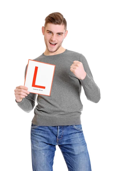 Man with learner driver sign — Stock Photo, Image