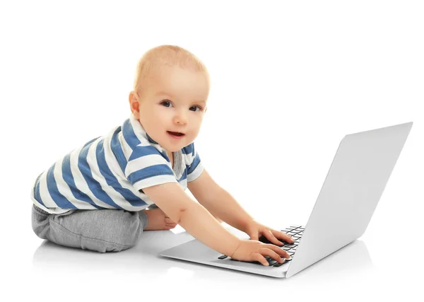 Cute baby boy with laptop Royalty Free Stock Photos