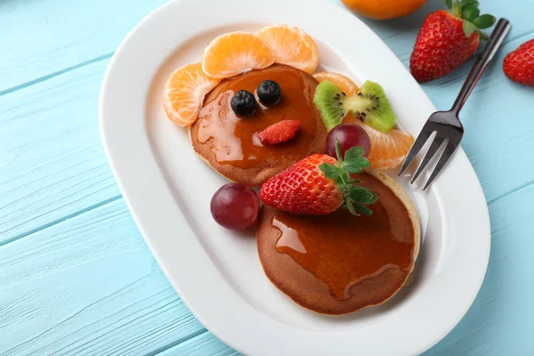Plate with creative homemade pancake — Stock Photo, Image