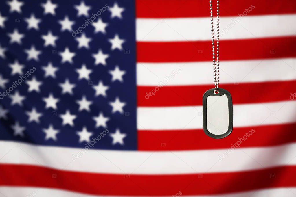 Military ID tag on USA flag 