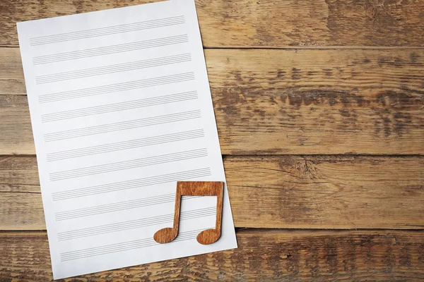 Music note and sheet of paper