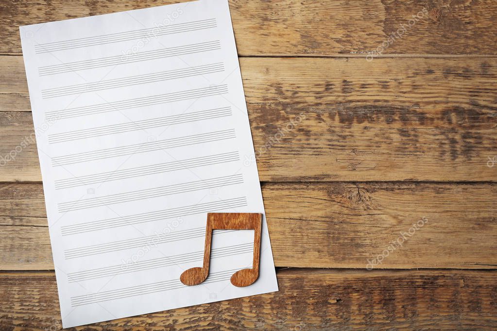 Music note and sheet of paper