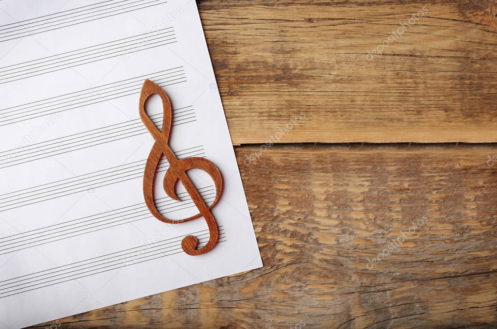 Treble clef and sheet of paper