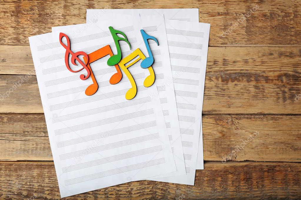 Music notes and sheets of paper