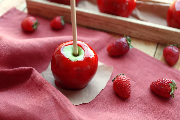 Candy apple with strawberries — Stock Photo, Image