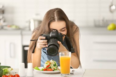 woman photographing food clipart