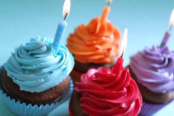 Birthday cupcakes with candles — Stock Photo, Image