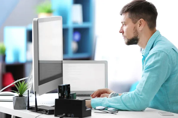 Handsome young programmer — Stock Photo, Image