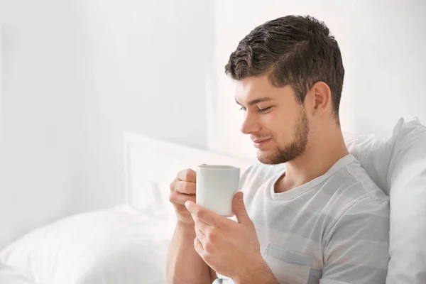 Man drinking coffee at home — Stock Photo, Image