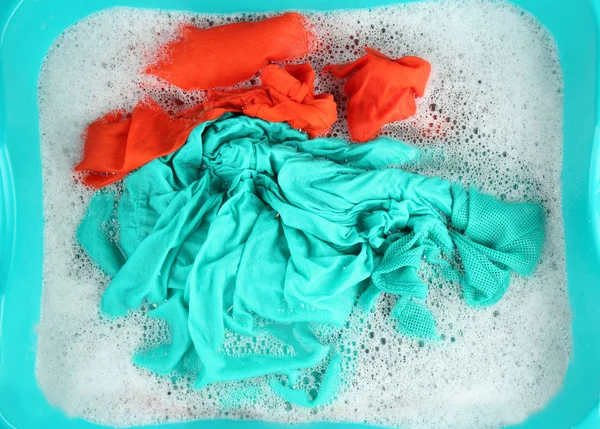 Wet color clothes with foam — Stock Photo, Image