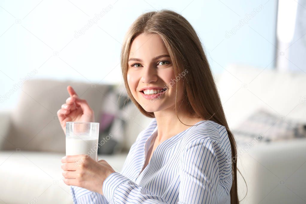 woman with glass of milk