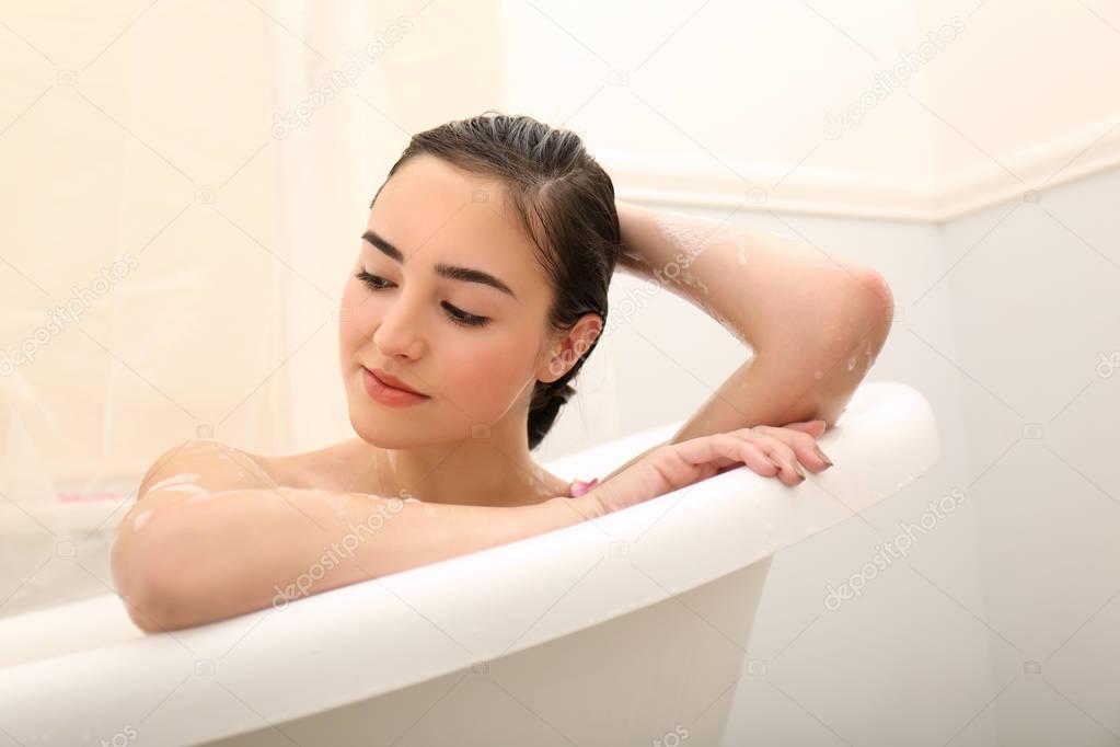 woman taking relaxing bath