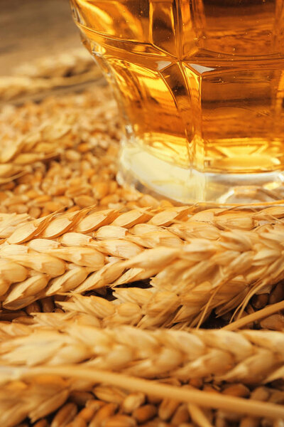 Barley seeds and glass of beer