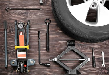 Car wheel with tools   clipart