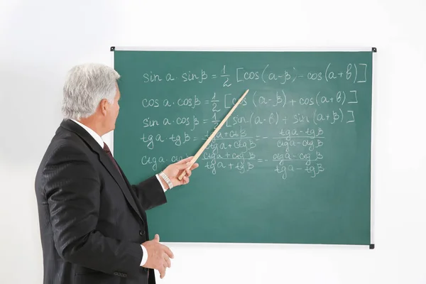 Senior teacher with pointer — Stock Photo, Image