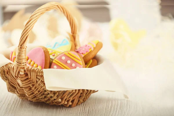 Wicker basket with Easter cookies — Stock Photo, Image