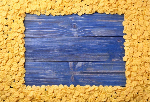Frame van cornflakes op grijs — Stockfoto