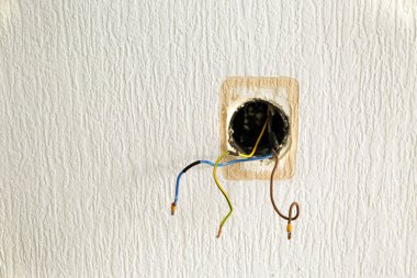 Wall with wires of socket clipart
