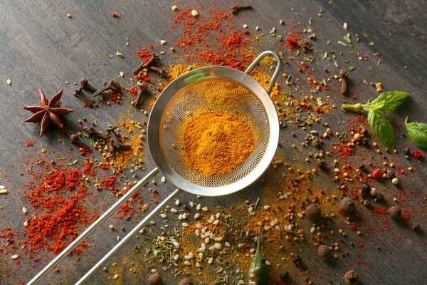 Assortment of spices and sieve