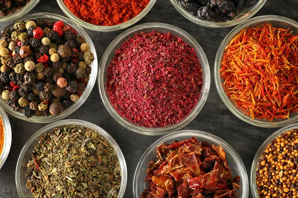 Various spices in glass bowls — Stock Photo, Image