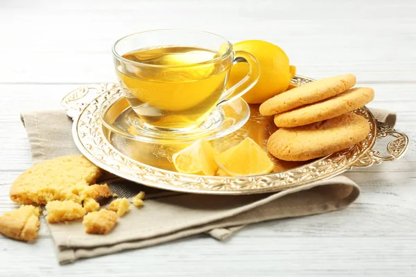 Cookies, green tea and lemons — Stock Photo, Image