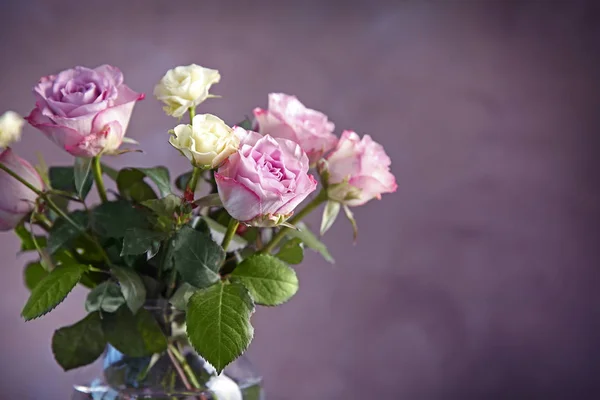 Glass vase with bouquet — Stock Photo, Image