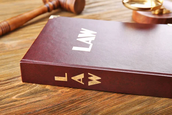 Law book with judge gavel and scales — Stock Photo, Image