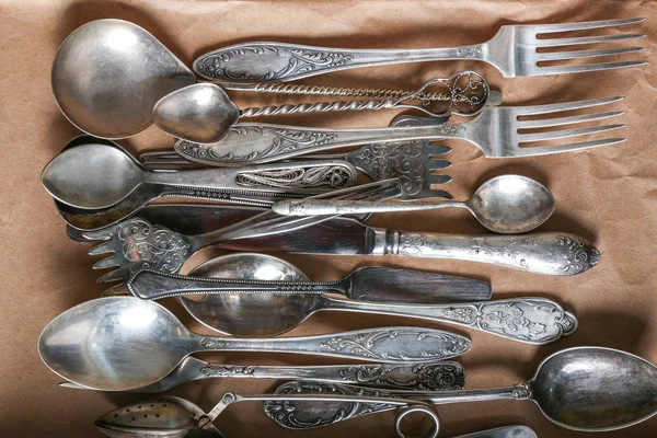 Set of silverware on paper — Stock Photo, Image