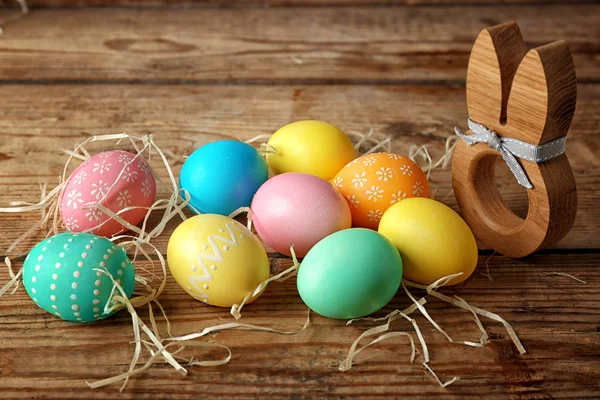 Easter eggs on wooden table — Stock Photo, Image