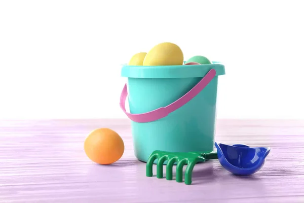 Easter eggs with pail — Stock Photo, Image