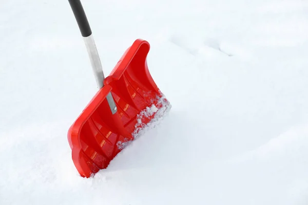 Red plastic shovel — Stock Photo, Image