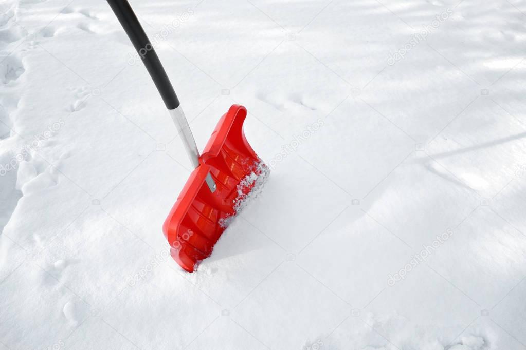 Red plastic shovel