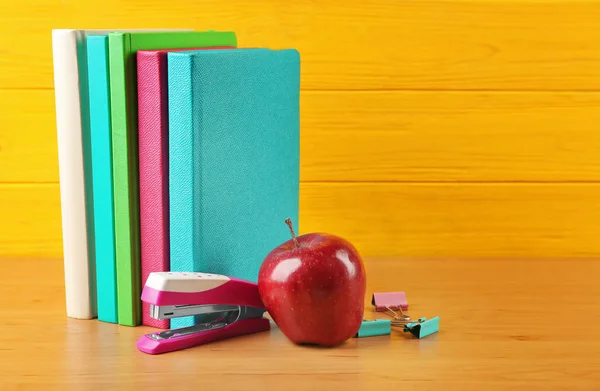 Pile of books and apple — Stock Photo, Image