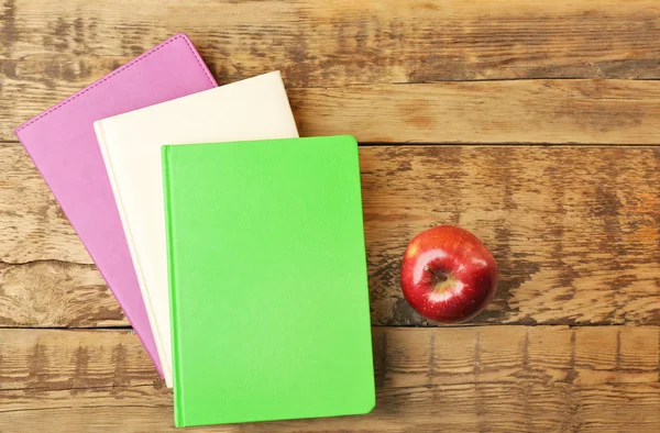 Pile of books and apple — Stock Photo, Image