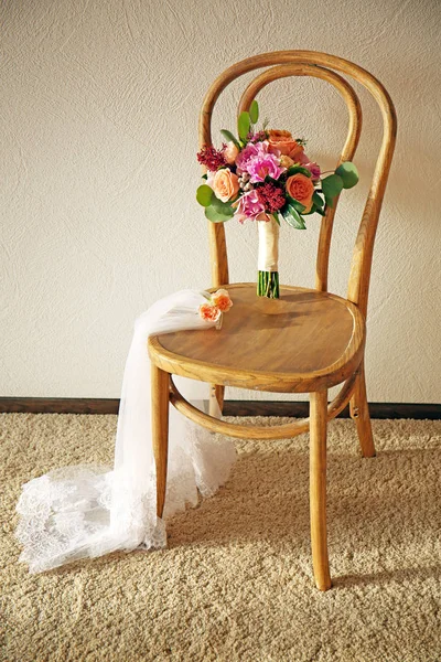 Bridal bouquet on chair — Stock Photo, Image