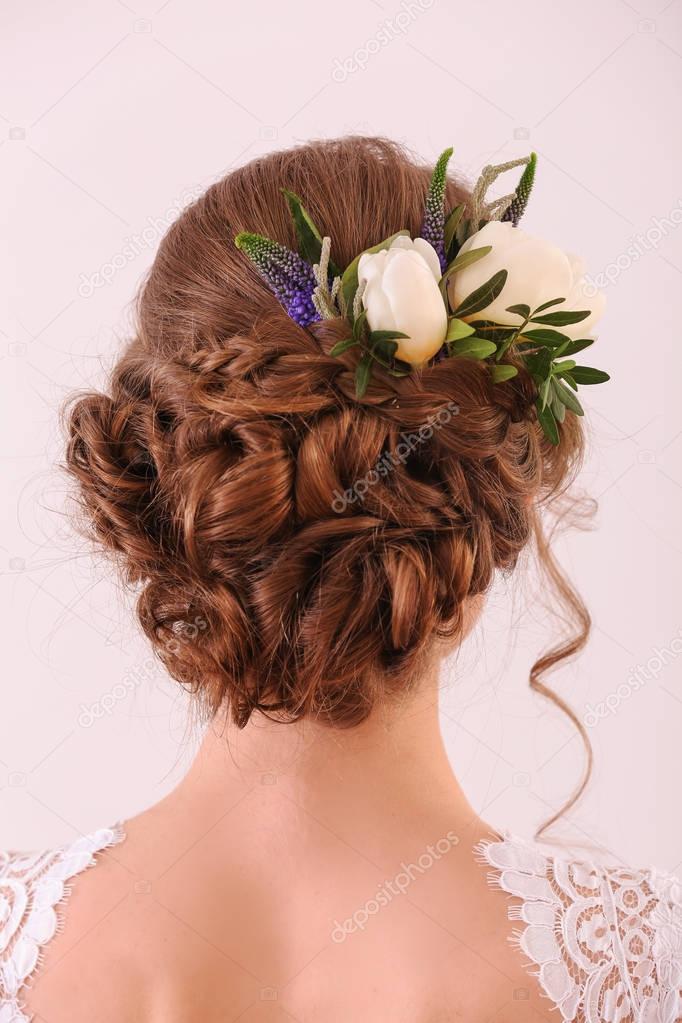 Young bride with beautiful hairstyle 