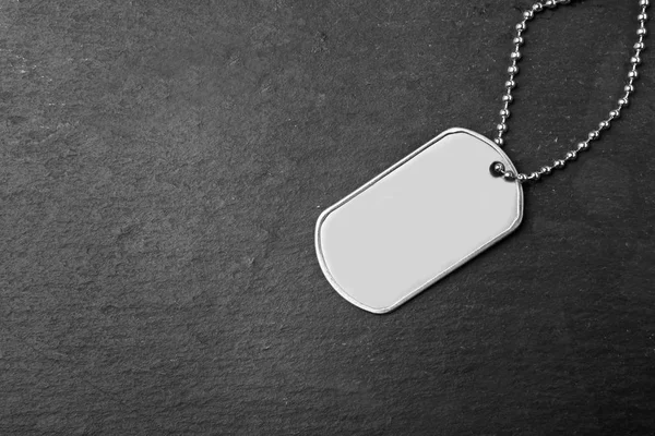 Military ID tag on dark — Stock Photo, Image