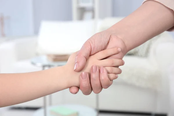 Hands of grandmother and her grandchild — Stock Photo, Image