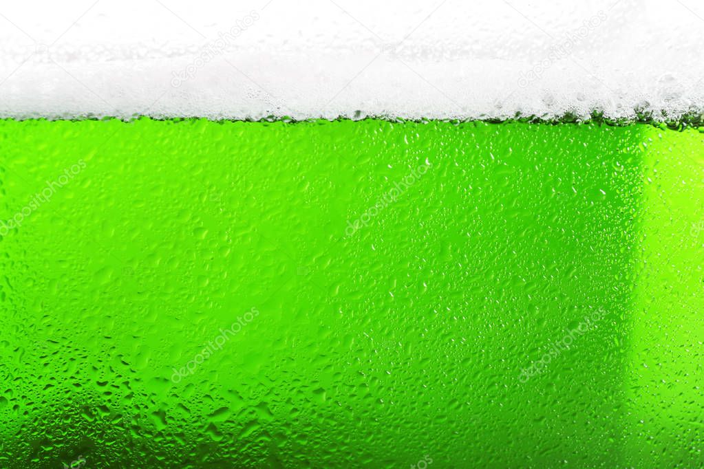 glass with green beer.